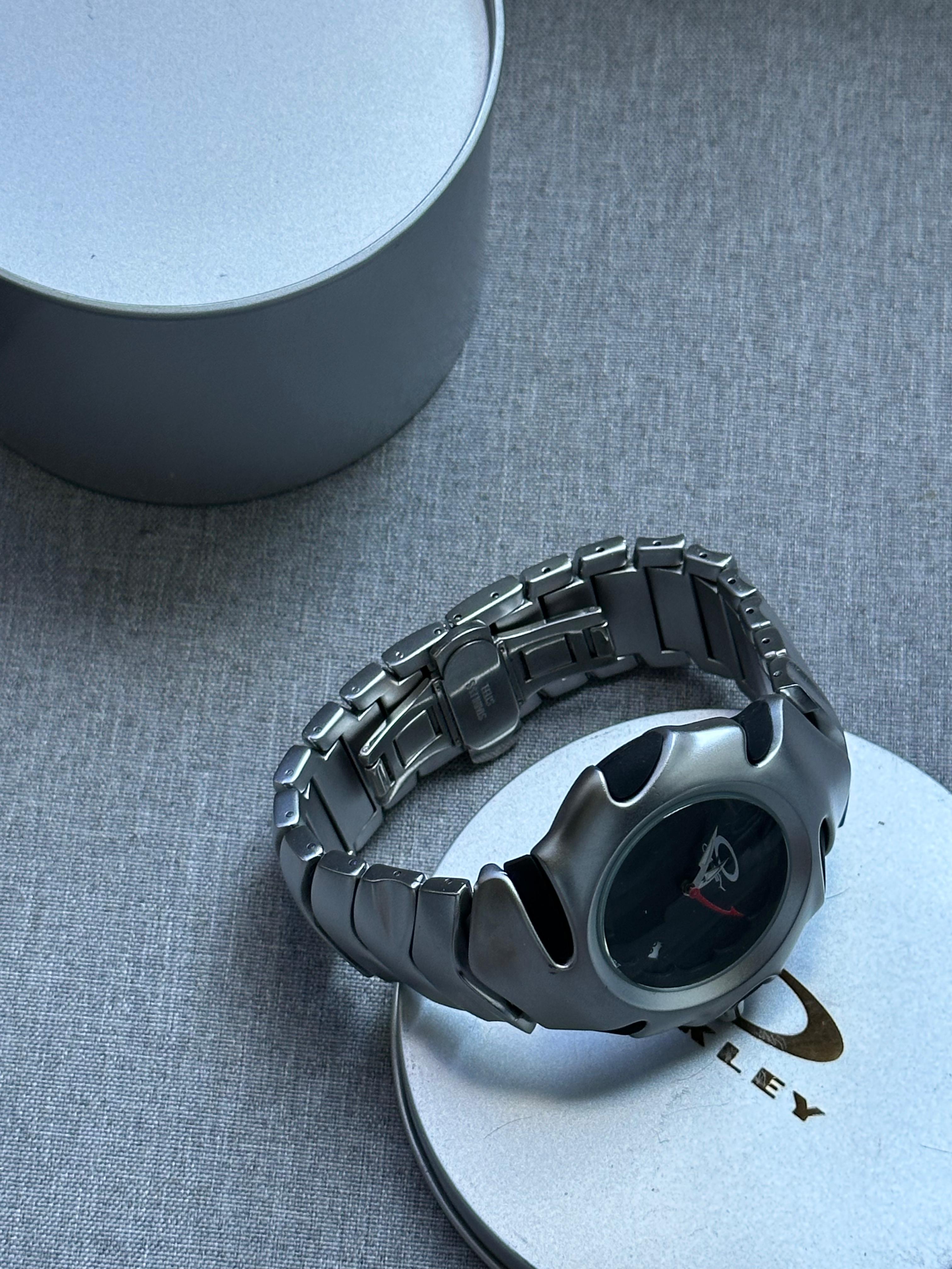 Oakley Blade Watch: Silver brushed Stainless Steel with Black Dial, Swiss Movement